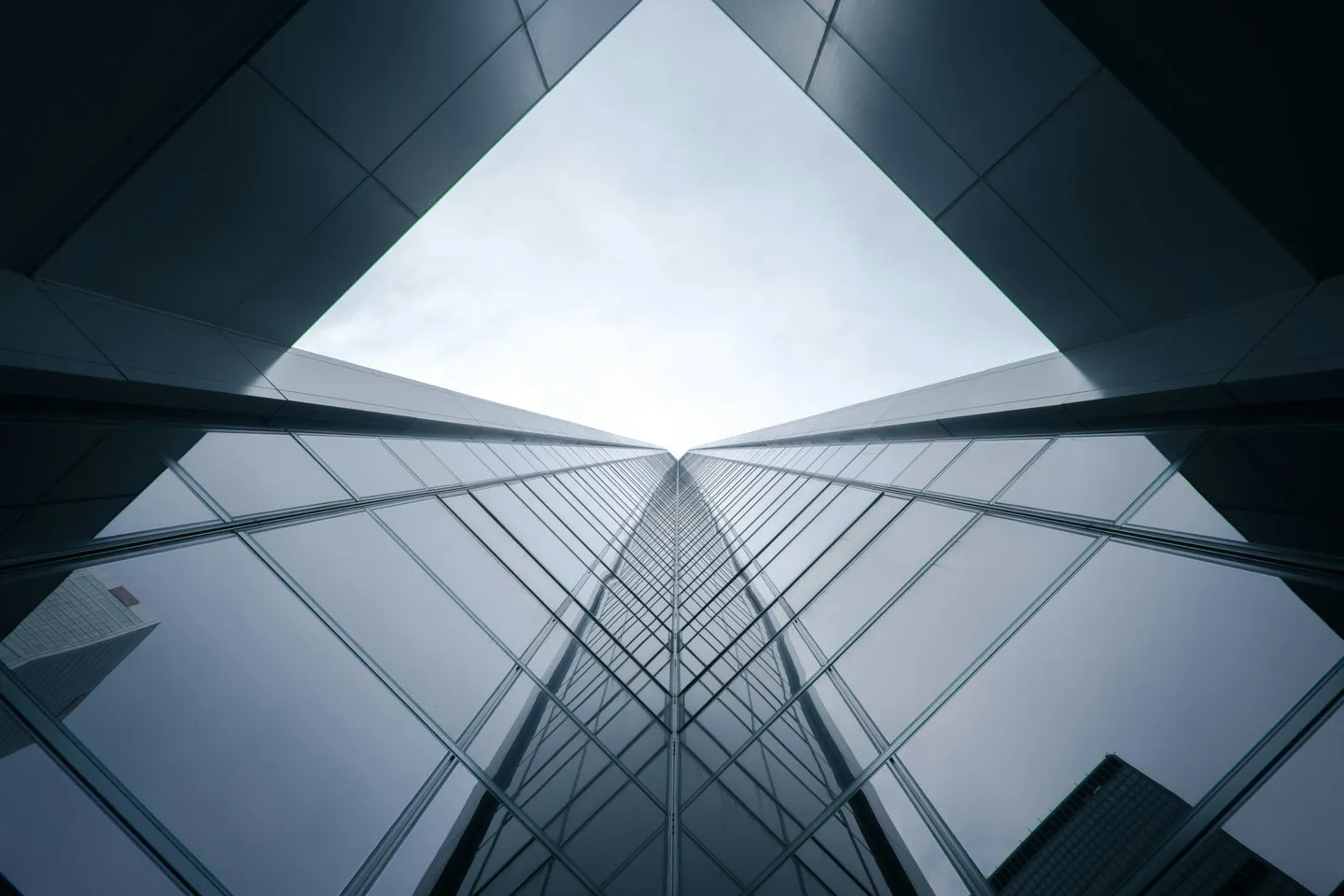 Looking up through modern glass architecture